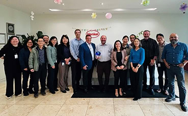 Amkor and Henkel team members at award ceremony